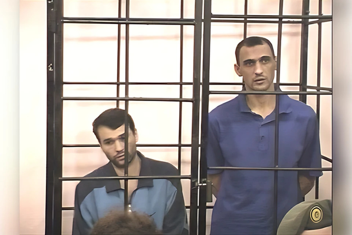 Исполнитель убийства Сергей Кулев (СПРАВА). Скриншот с видео